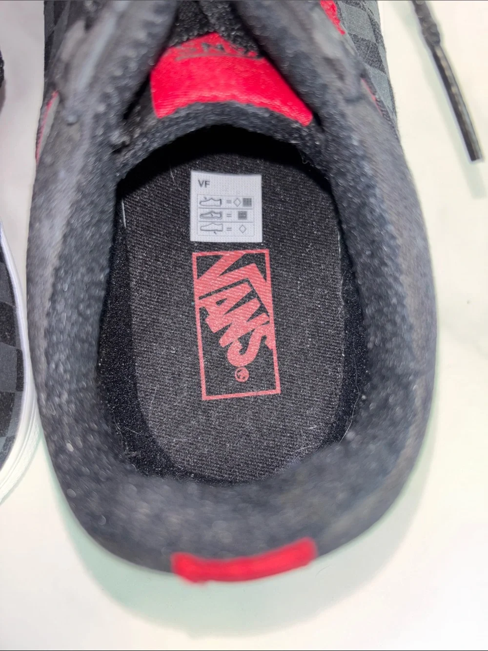 Vans Kids Checkerboard Low Top Sneakers in Black and Red
